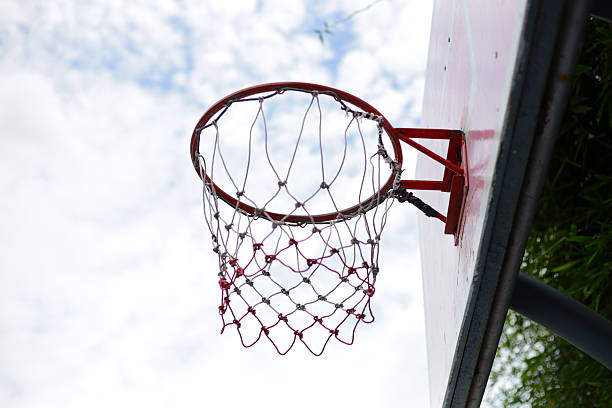 istock Old basketball hoop with a worn net 2232978827