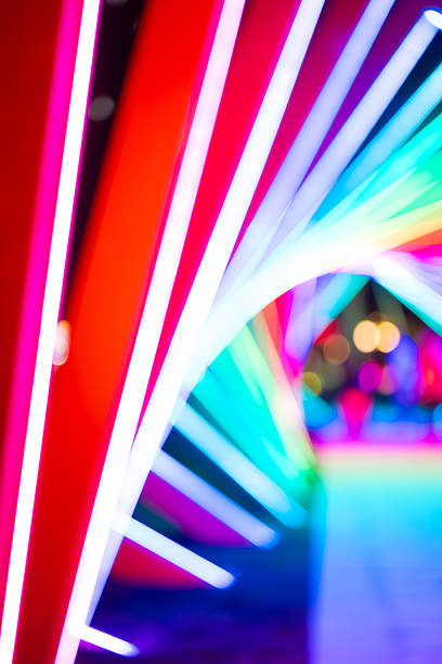 istock out-of-focus colorful light trails at vertical composition as background 2232981861