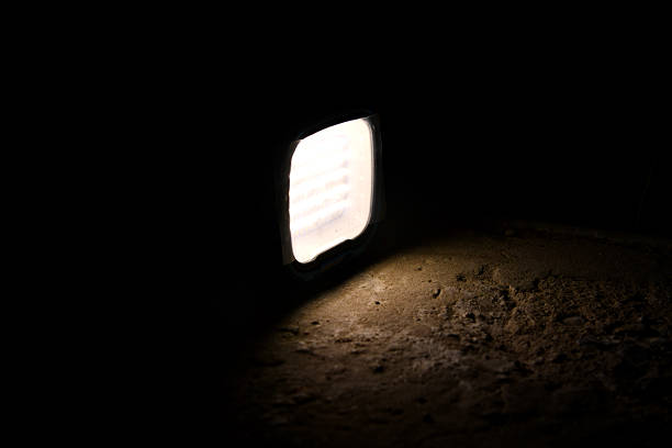 flashlight and light beam in dark mist room at night . abstract projector spotlight white lay growing .