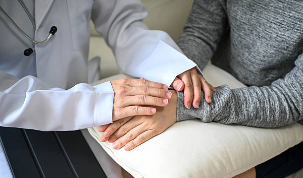 istock Human Connection in Healthcare: Doctor’s Reassuring Touch 2232986723