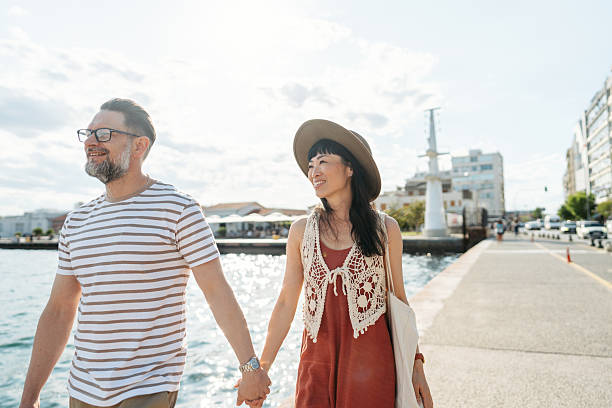 istock Romantic couple's roaming the city on their vacation 2232988034