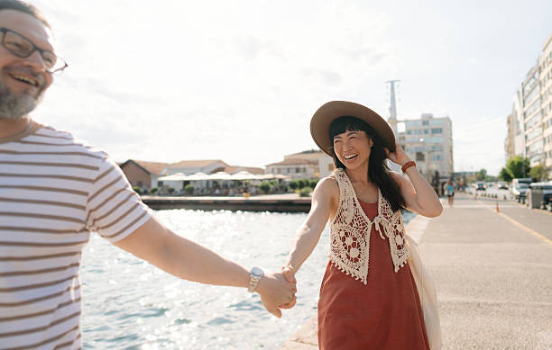 istock Romantic couple's roaming the city on their vacation 2232988107