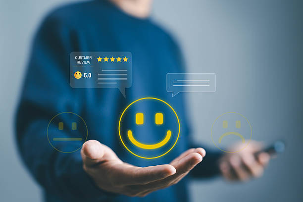 istock Customer review and satisfaction rating concept with smiley face and five-star feedback, representing positive service experience, business trust, and online reputation management. impression customer 2232994829