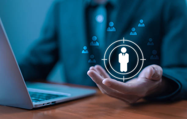 istock Business targeting concept with customer focus icon in hand, symbolizing audience segmentation, marketing strategy, and client analysis. Human Resource Management, HR Digital Business. 2232994964