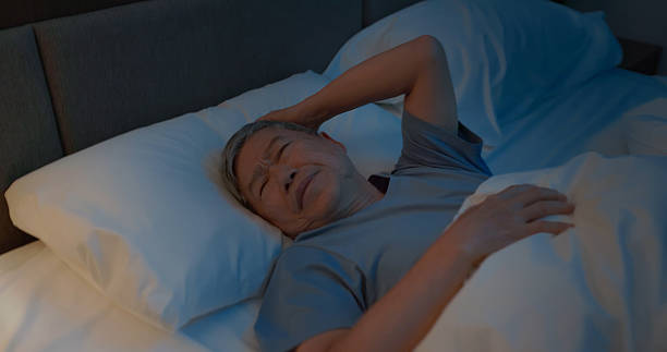 istock asian elderly man suffer from insomnia home 2232997538