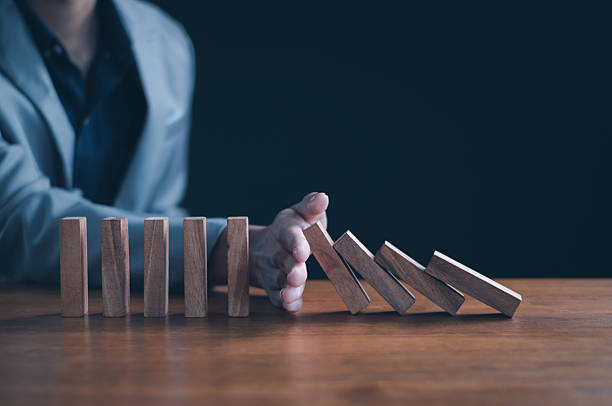 istock Business planning crisis effect or risk protection concept, business solution and intervention. 2233000284