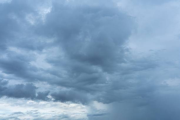 istock Dense gray storm clouds fill the sky heavy cloud cover Gray Clouds Cloudy Sky 2233001688