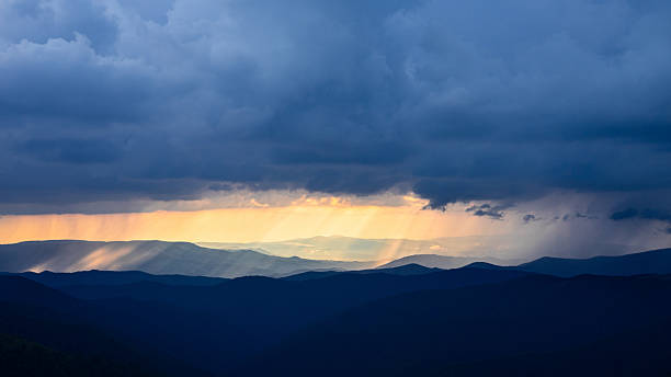 istock sunbeams before or after rain, thunderstorms, play of light in the mountains 2233002858