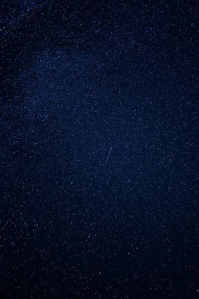 istock Star Filled Night Sky with Meteor Streak in Center 2233007877