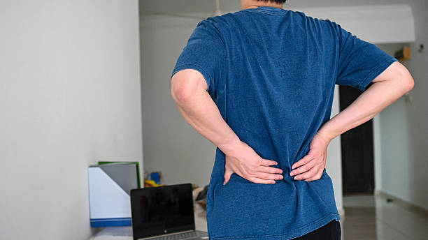 istock Everyday Pain: Man Struggling with Muscle Strain in Morning Routine 2233016288
