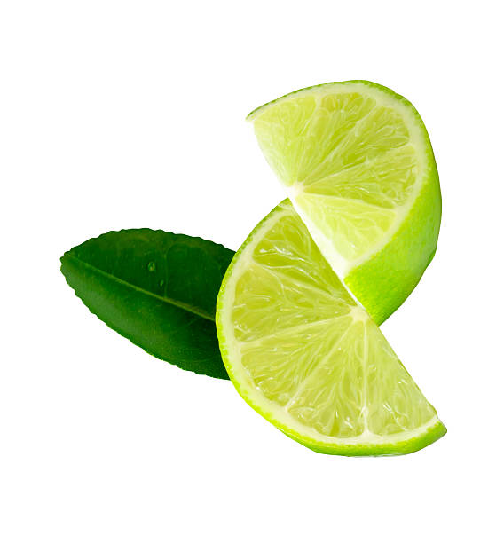 istock Front view of fresh green lemon in two quarters with one green lemon leaf in stack isolated on white background with clipping path 2233018007