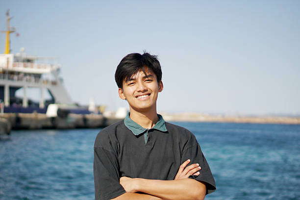 happy and enthusiastic asian young man