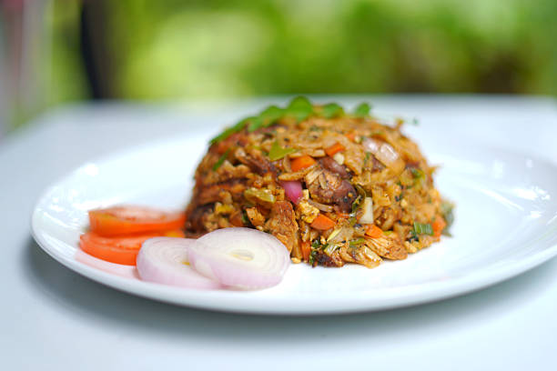 istock Traditional Sri Lankan Chicken Kottu Roti with Fresh Vegetables. 2233030155