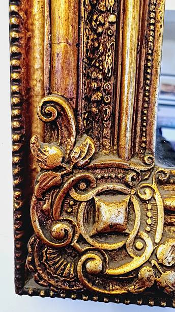 istock Gold leaf mirror and part of picture frame 2233030419