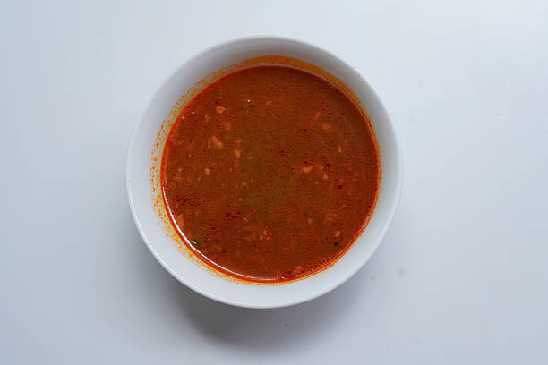 hot chicken gravy bowl on white desk