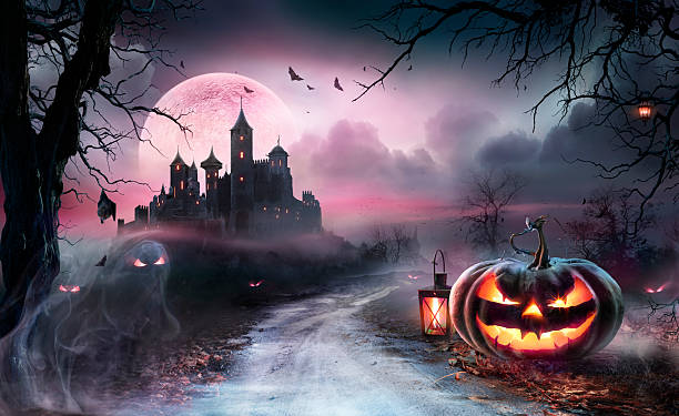 istock Halloween Pumpkins On Road With Medieval Castle At Moonlight 2233033318
