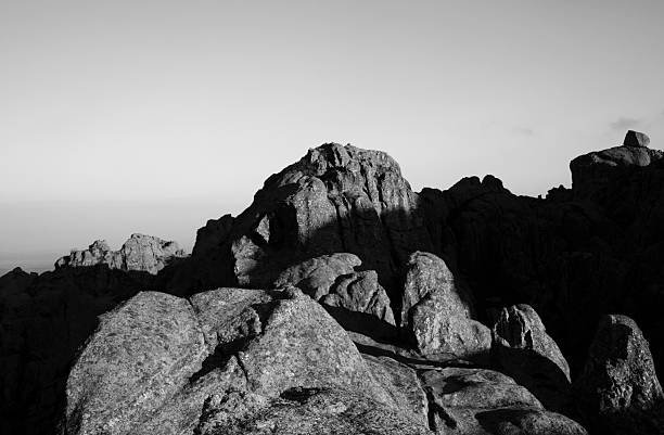 istock View fo the rocky cliffs high in the mountains at nightfall 2233035416