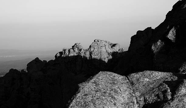 istock View fo the rocky cliffs high in the mountains at nightfall 2233035451