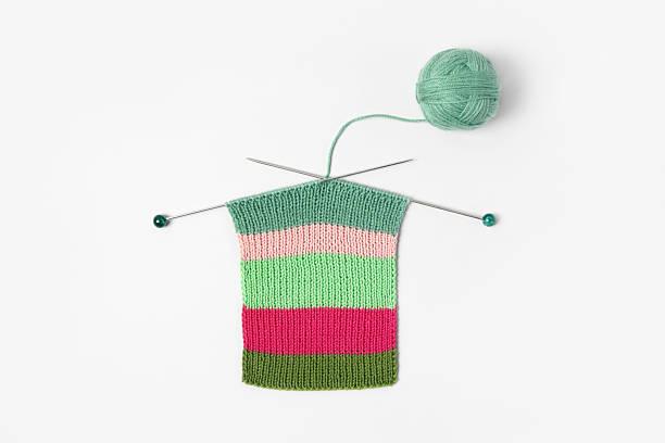 istock Ball of thread with knitting needles and knitted fabric 2233039177