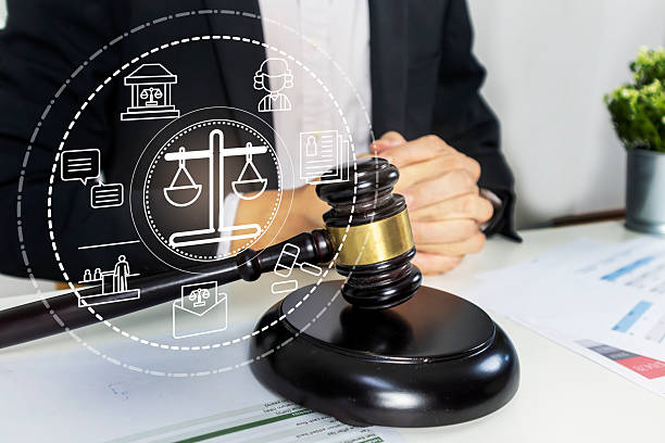 istock Judging conflicts and providing justice to people. ,Judge's Hammer in Judgment and Law,Litigation and legal action in business 2233039356