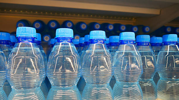 istock Many sparkling water bottles standing in a row 2233044002