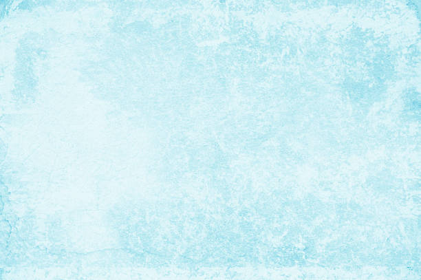istock Light bright pastel sky blue coloured empty blank smudged blotches over textured symmetrical grunge backgrounds water color 2233051782