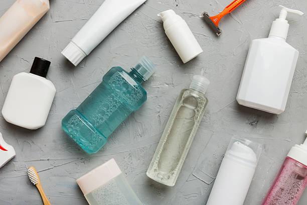 istock Mockup for bathing products top view flat lay, spa razor, toothpaste, soap, gel and other various accessories. Cosmetics for skin health. Bath Mockup for your logo 2233056280