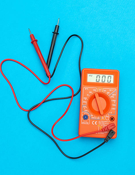 istock Digital Multimeter on Blue Background with Red and Black Probes for Electrical Measurement 2233060269