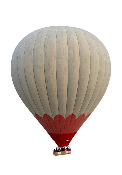 Hot air balloon is inflated in the early morning hours by a Latino man with an average age of 50 years who is the pilot in charge of providing this experience to tourists.