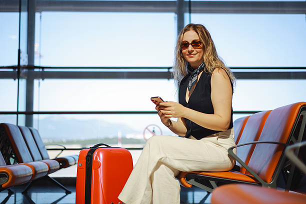 istock Young female passenger waiting for flight 2233067764