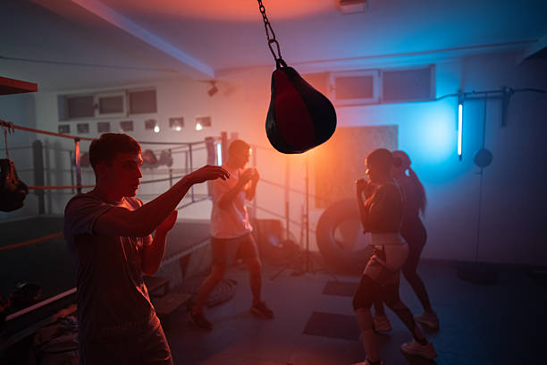 istock Young Boxers Training in a Gym with Focused Determination 2233070764