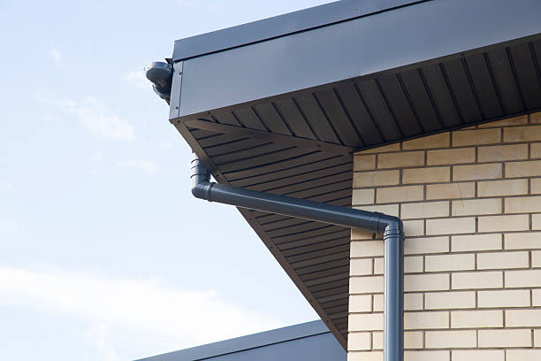 istock Modern guttering on a modern roof. Roof drainage. 2233071101