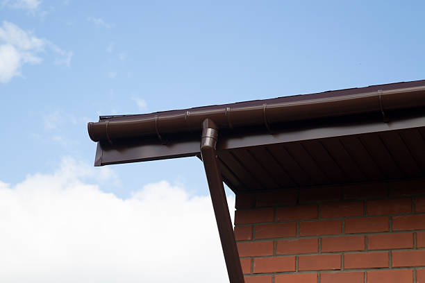 istock Modern guttering on a modern roof. Roof drainage. 2233071148