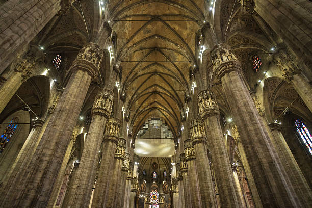 istock Stained Glass and Stone Columns in Milan Cathedral 2233073443
