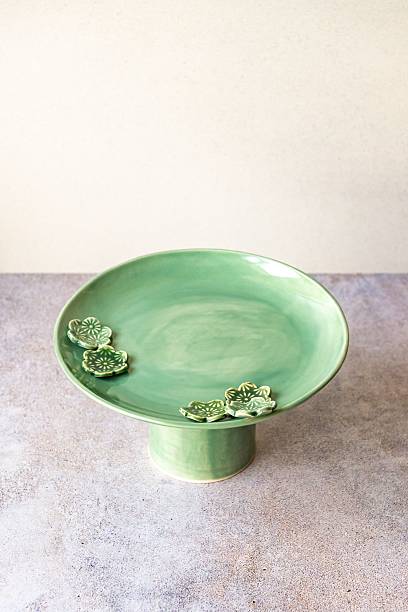 istock Elegant Green Ceramic Pedestal Plate 2233073753