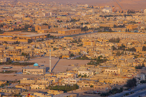 istock Palmyra cityscape under golden sunlight in syria 2233077117