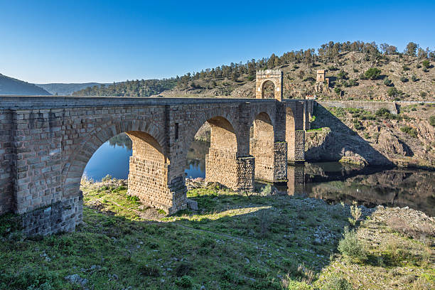 istock Exploring the ancient Roman bridge in Alcantara, Extremadura, Spain 2233081248