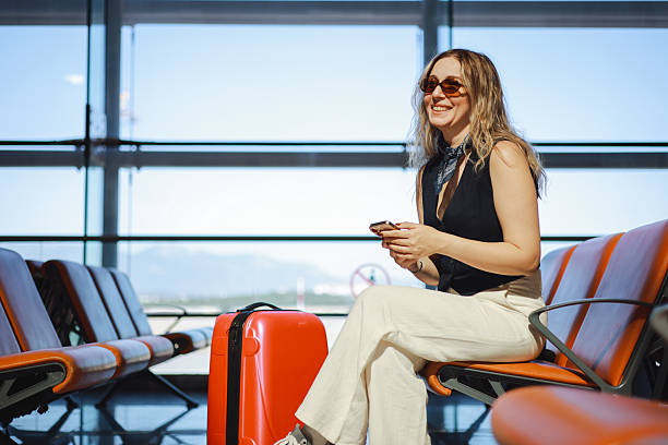istock Young female passenger waiting for flight 2233081576