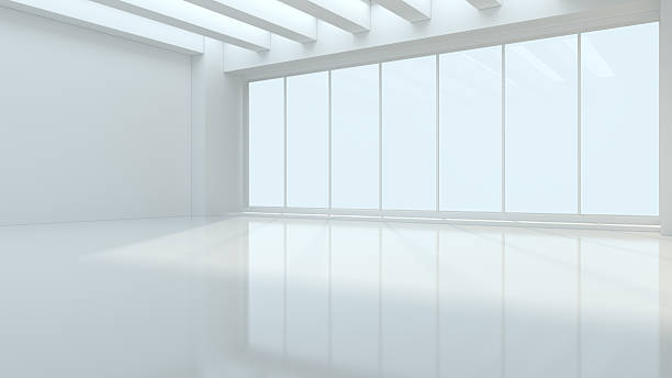 istock Empty interior. White walls. Soft, natural light filters in, casting gentle shadows that enhance the stark, modern aesthetic 2233083258