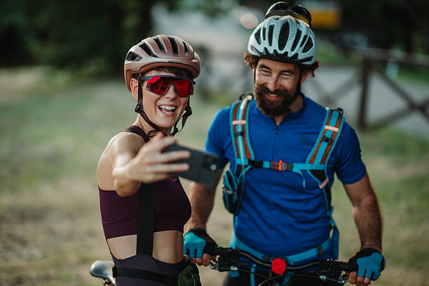 istock Smiling cyclists taking a selfie after a bike ride 2233083345