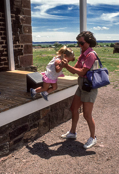 istock Fort Davis NHS - Mother Helps Daughter Down - 1984 2233083880