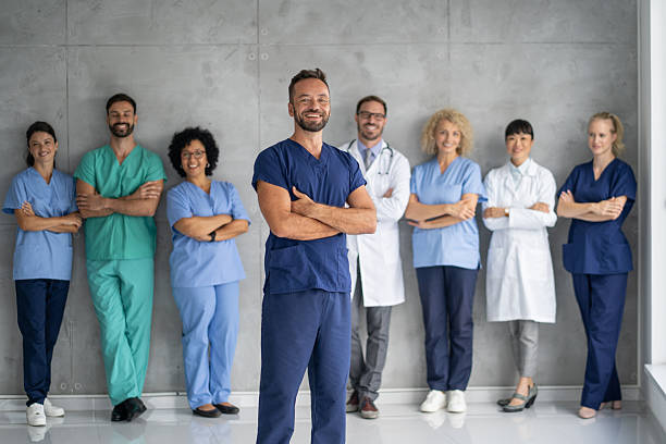 istock Confident medical team posing together in modern clinic 2233087392