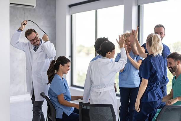 istock Emotionally Charged Healthcare Workers Sharing Joy 2233087400