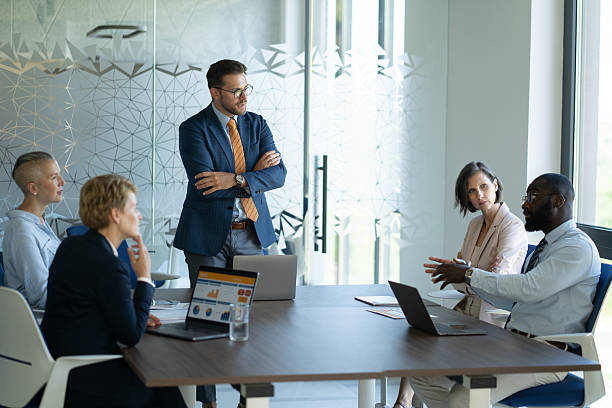istock Business team discussing strategy during office meeting 2233088035