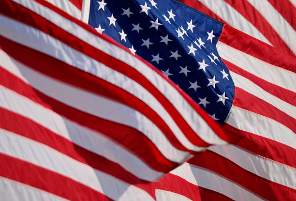 istock American flags in the wind 2233088485