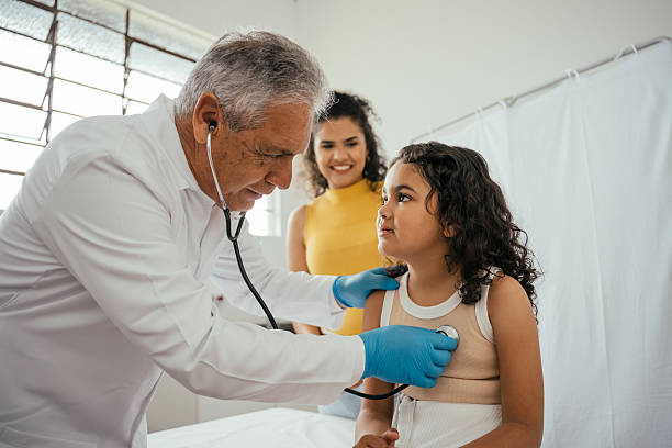 istock Pediatrician examining child with stethoscope 2233089373