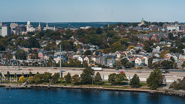 Providence River and remote Downtown view. Highway 195 / i-195 with traffic on it.