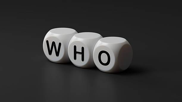 istock who? .the word spelled out using wooden dice. Education concept.3D rendering on black background. 2233095531