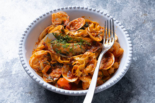 istock italian seafood pasta in tomato sauce 2233096488