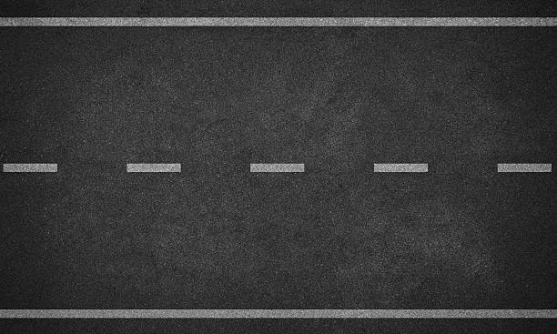istock Asphalt road with white lane marking top view. 2233098196